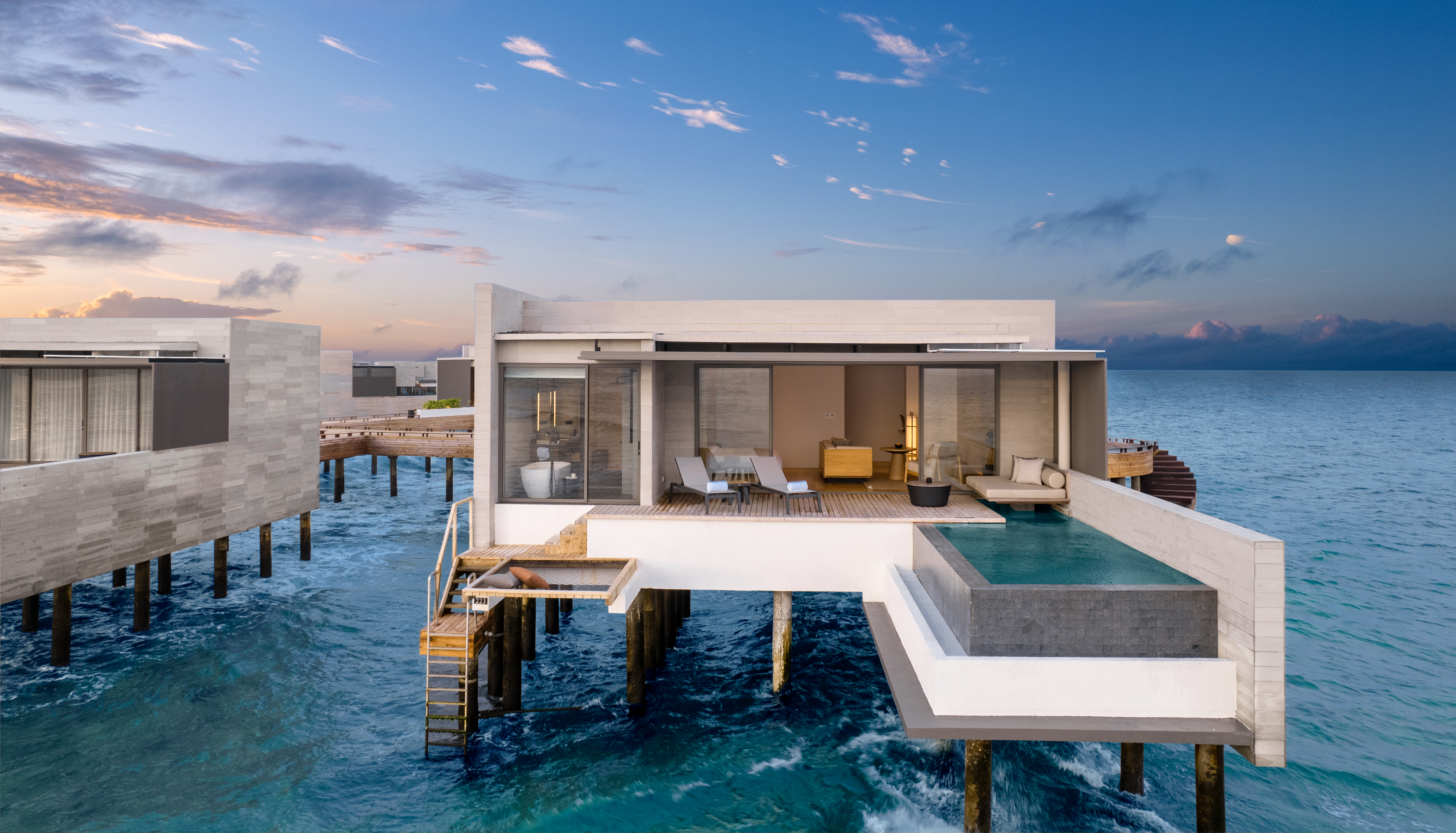 Alila-Kothaifaru-Maldives-Sunset-Overwater-Pool-Villa-Exterior-Evening-Shot