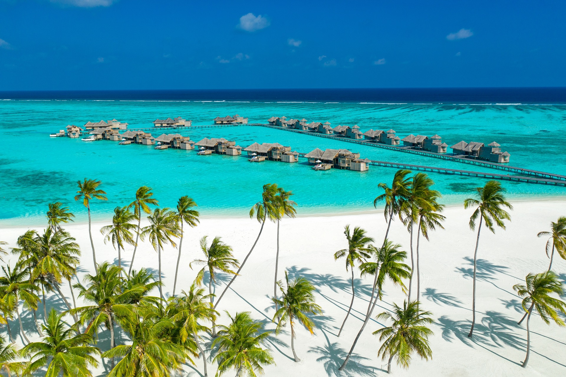 Gili Lankanfushi_Aerial shot of jetty one and palm beach