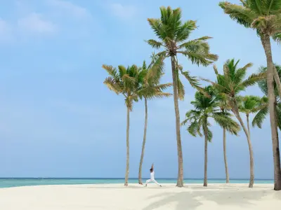 Alila Kothaifaru Maldives - Beach Yoga