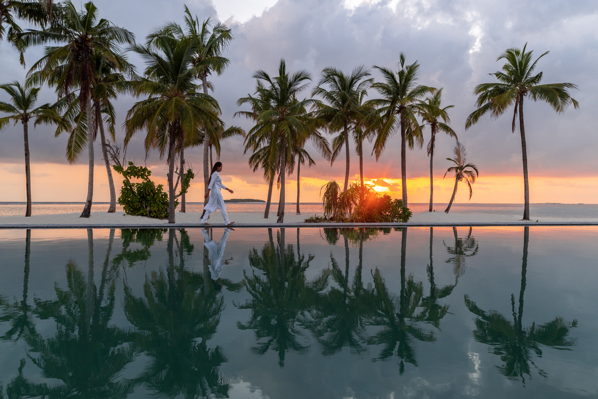Alila Kothaifaru Maldives - Infinity Pool with Sunset