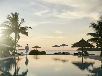 COMO Cocoa Island Poolside at Sunset