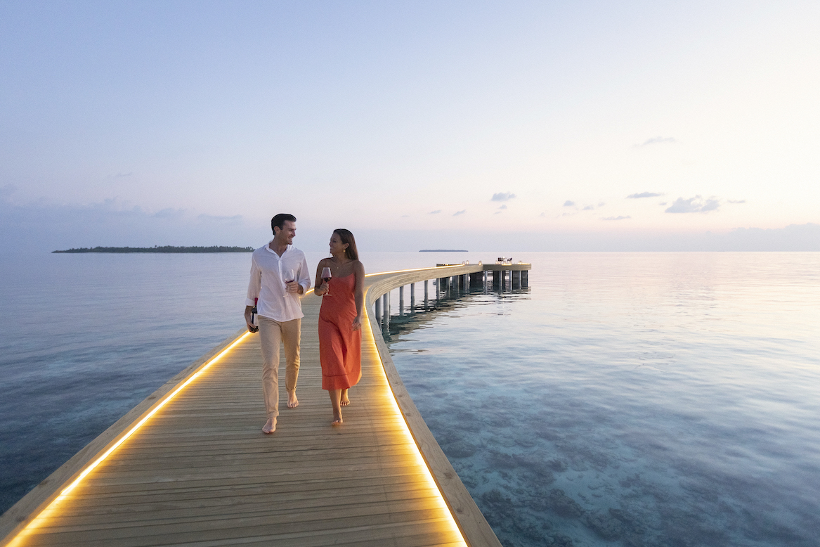 Emerald Faarufushi Resort & Spa couple walk