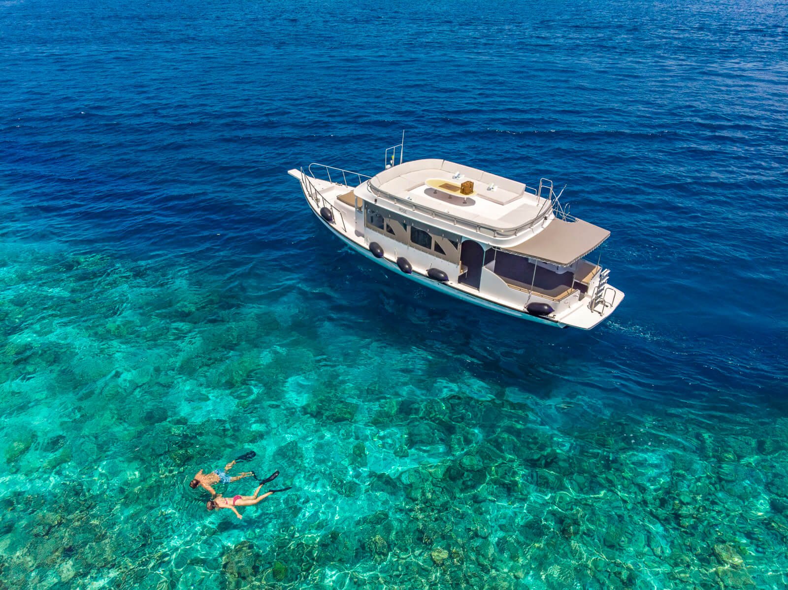 Hurawalhi Island Resort Snorkelling Couple