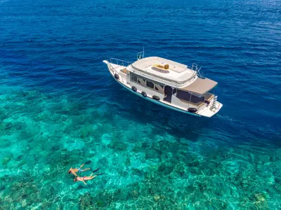 Hurawalhi Island Resort Snorkelling Couple