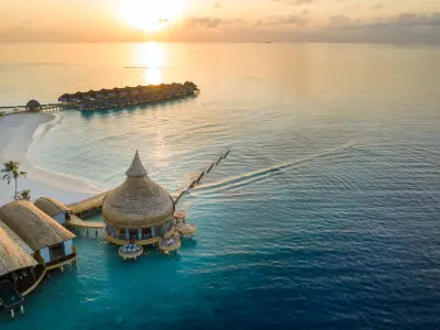Moodhu Grill Aerial Sunset Outrigger Maldives Maafushivaru
