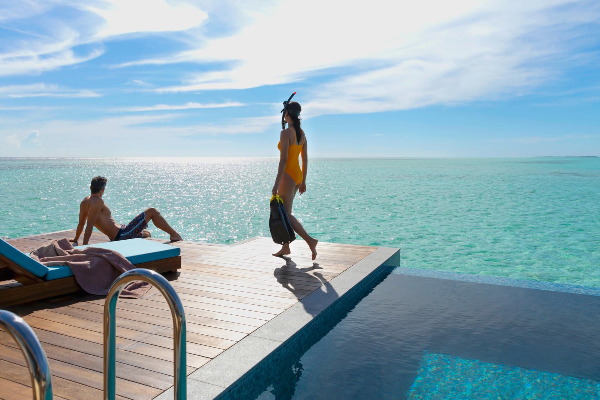 Pullman Maldives Maamutaa Snorkeling Couple